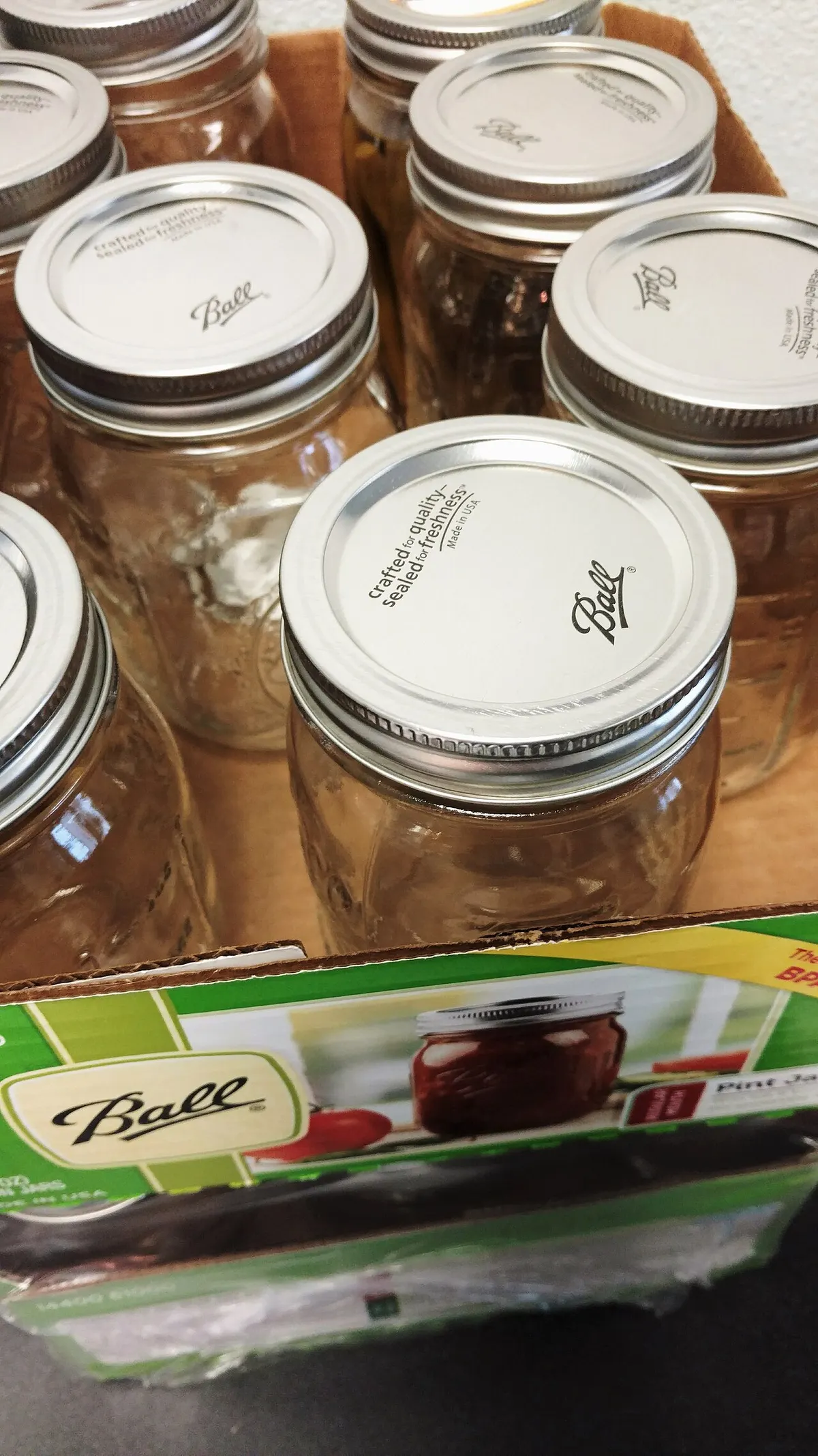 Home canning jars with lids and rings, ready for a first batch